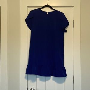 Adorable tulip sleeved bright blue dress with ruffle bottom.